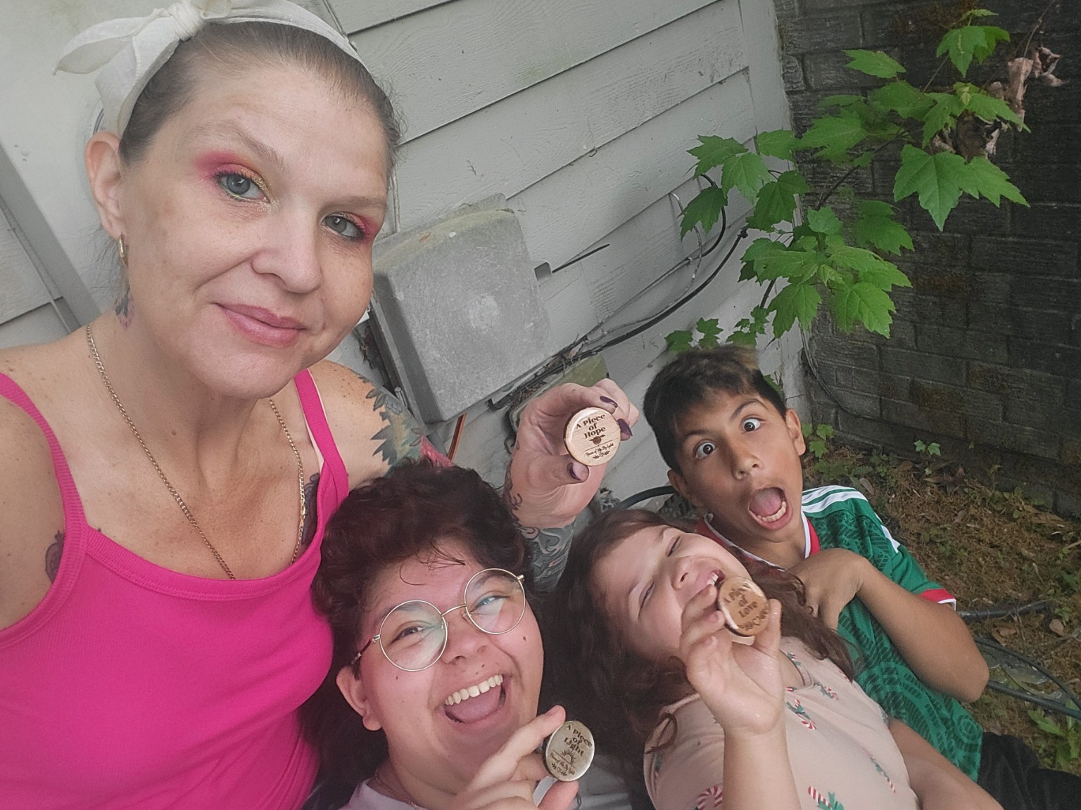 Lyddi sharing heartwork and smiles with loved ones