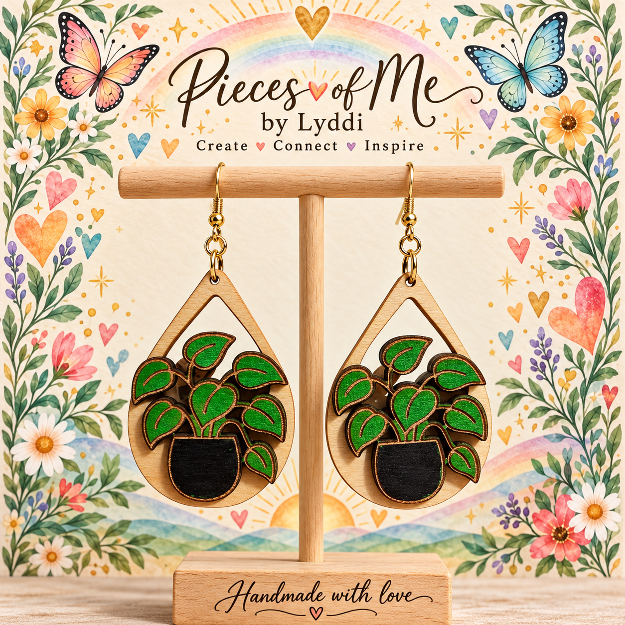 Plant Lover wooden earrings on a simple display stand